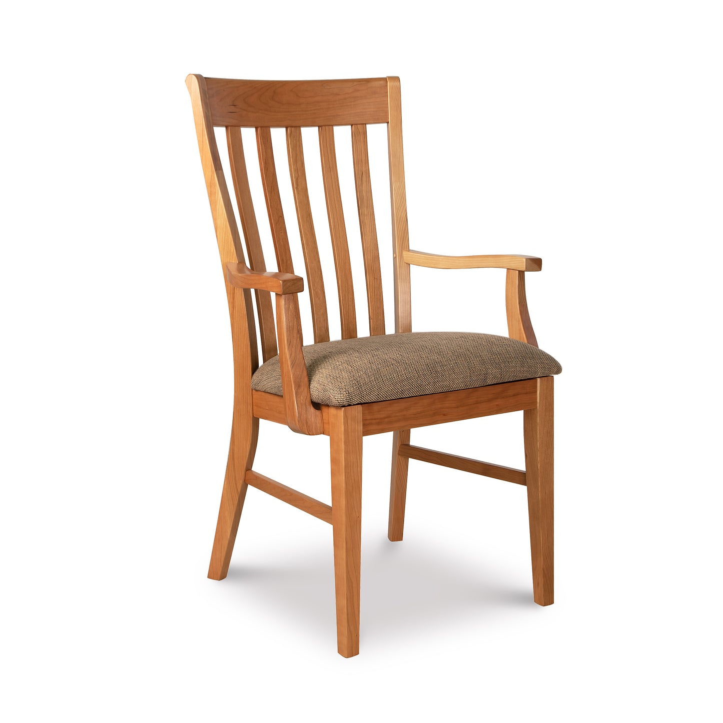 A Vermont Woods Studios Country Shaker Chair, a solid wood dining chair with armrests and a cushioned seat, featuring vertical slats on the ergonomic seat back. The chair is set against a white background.