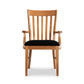 A Vermont Woods Studios Country Shaker Chair with a vertical slat back and armrests, featuring a black cushion on the seat, is positioned against a white background.