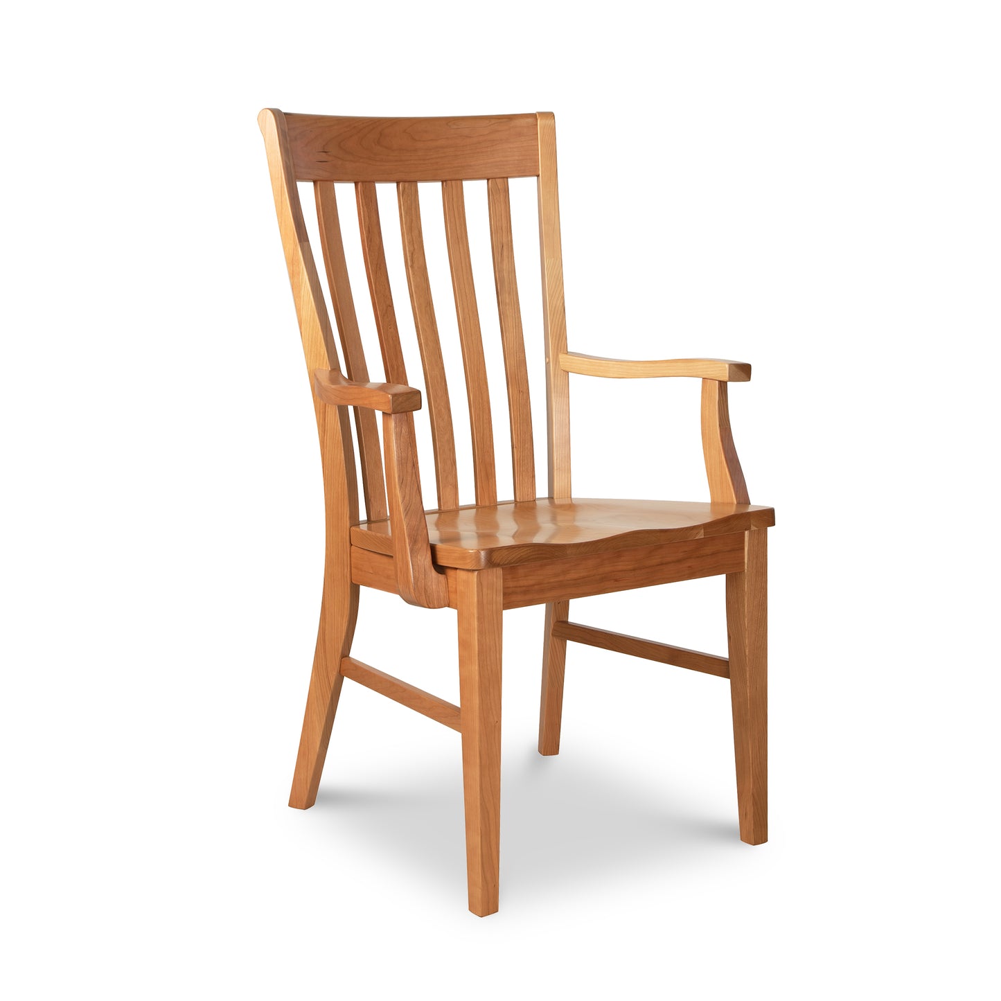 A wooden chair with a slatted back and arms.