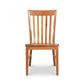 A Country Shaker Chair with Wood Seat from Vermont Woods Studios, featuring a high, slatted backrest and an ergonomic seat, isolated on a white background.