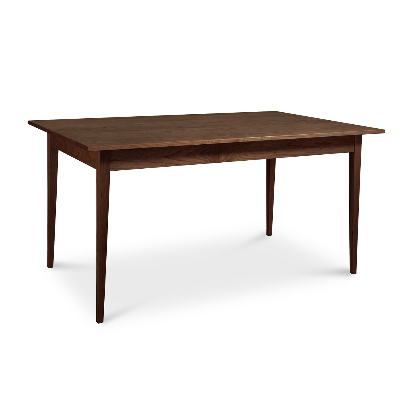 A Vermont Woods Studios Country Shaker Dining Table featuring a solid natural wood top and legs, offering different wood options.