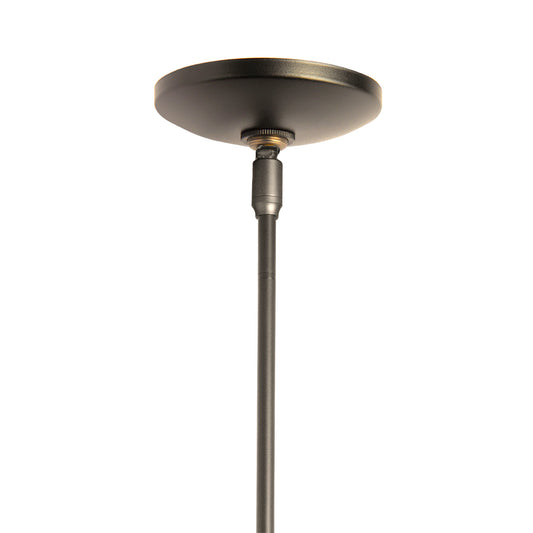 The Cuff Large Mini Pendant by Hubbardton Forge features a hand-forged steel cuff and metal rod, highlighting fine American-made craftsmanship.
