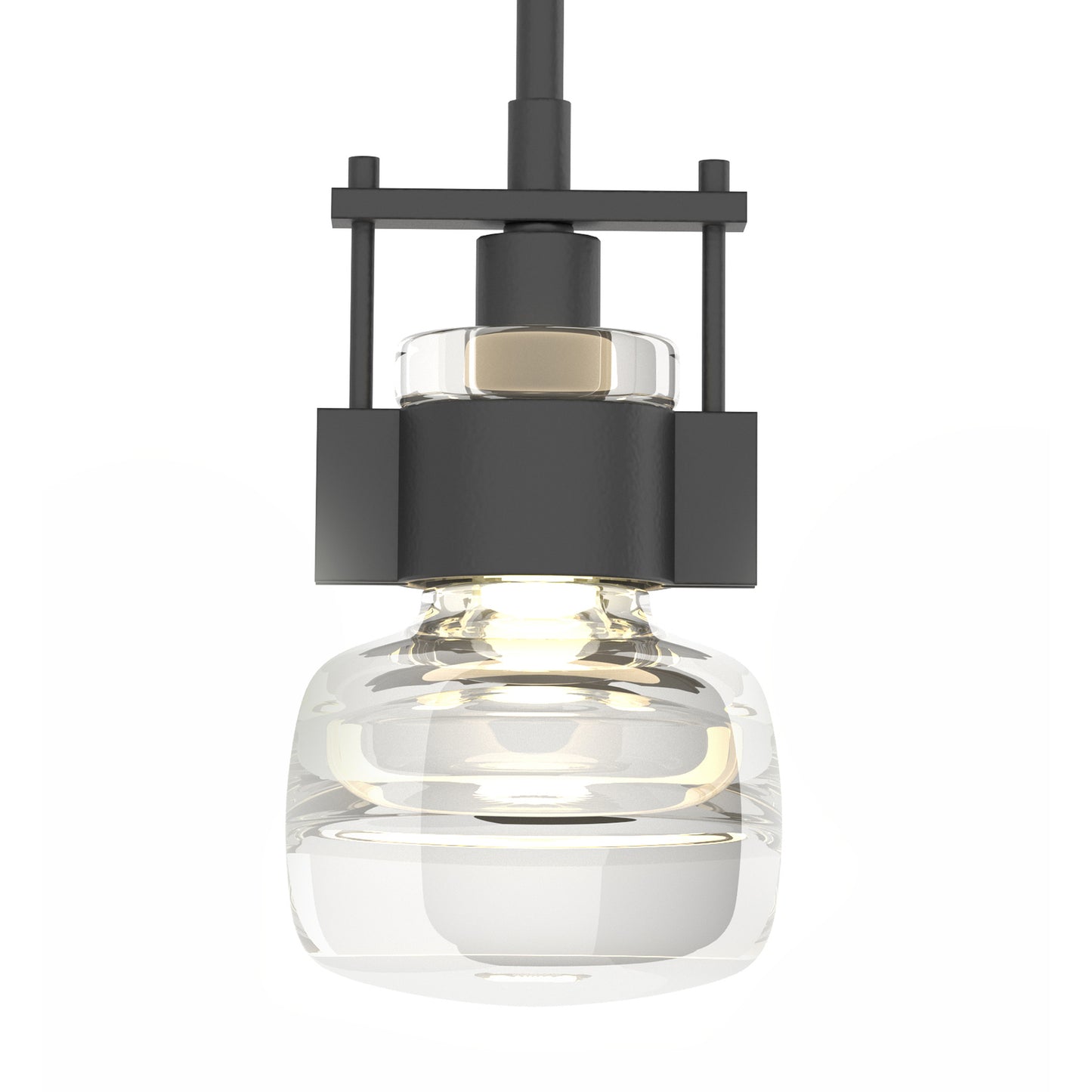 The Cuff Large Mini Pendant by Hubbardton Forge showcases elegant American-made craftsmanship with a clear glass shade and black metal fixture.