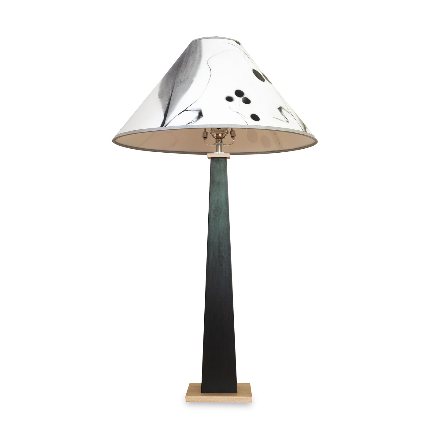 Dance of Life Table Lamp by Rock River Studio with a tall dark base and a handmade black-and-white abstract patterned shade, showcasing artisanal craftsmanship.