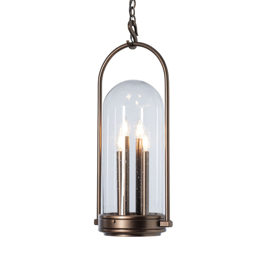 Davis Outdoor Lantern by Hubbardton Forge with hand-forged steel, bronze frame, and three candle bulbs, showcasing modern craftsmanship.