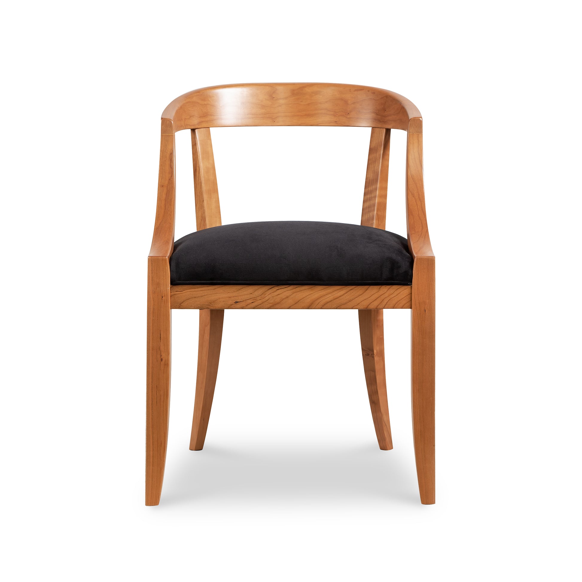 A wooden chair with black upholstered seat.