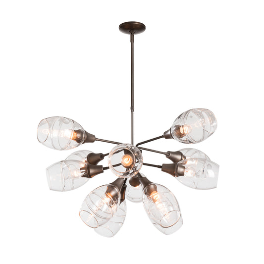 A Hubbardton Forge Ensemble Pendant chandelier featuring glass shades and a metal frame, perfect for space travel enthusiasts seeking designer lighting.