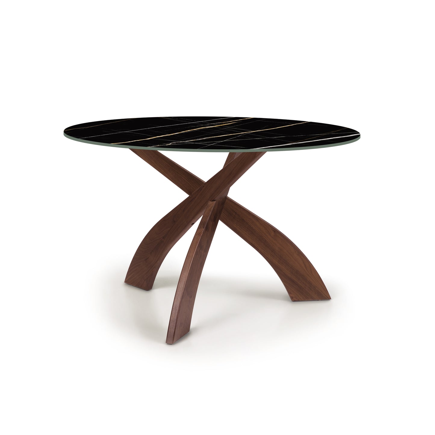 Entwine Round Table by Copeland Furniture with black stone top and sculptural cherry wood base.