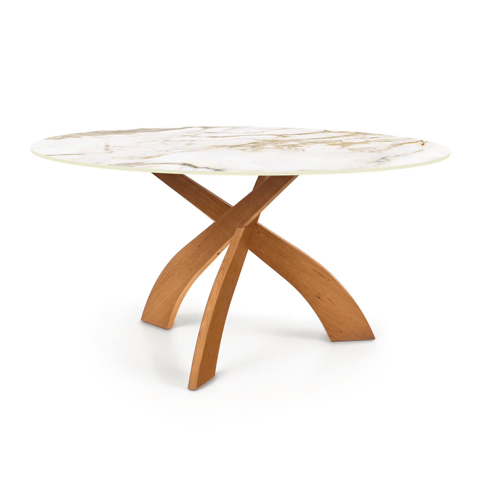 Entwine Round Table, with a sintered stone top and intersecting cherry wood base, by Copeland Furniture.