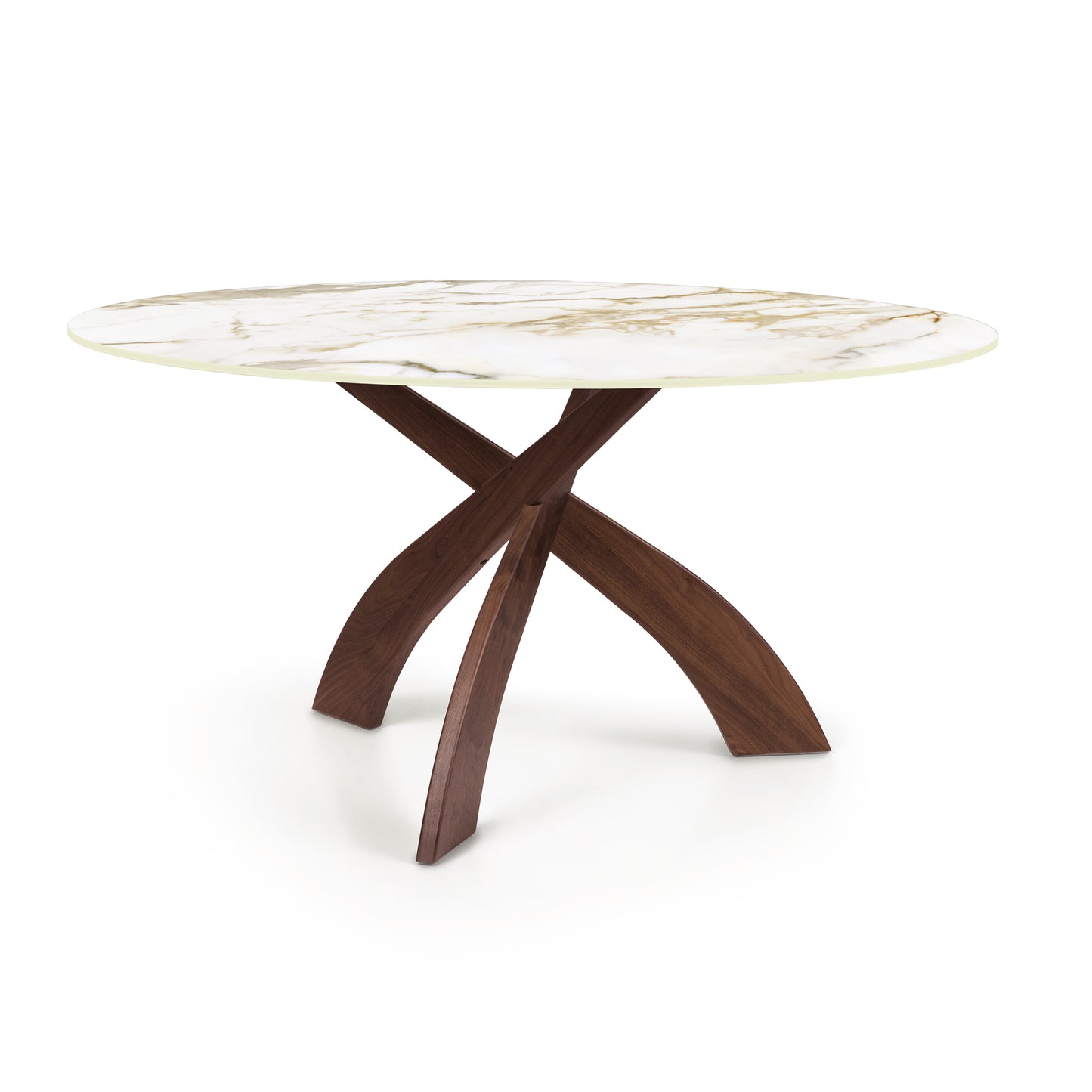 Round sintered stone top Entwine table with crossed cherry wood legs by Copeland Furniture.