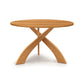 Entwine Round Solid Top Table by Copeland Furniture with three elegant curved legs and a smooth wood top, handcrafted in Vermont from quality hardwoods.