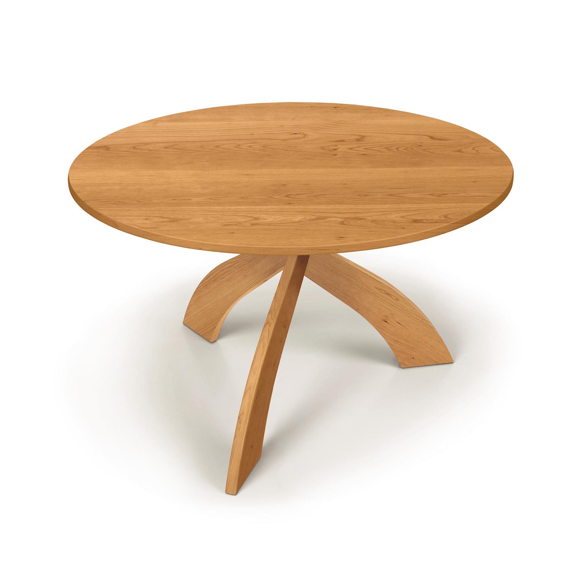 Entwine Round Solid Top Table by Copeland Furniture with cherry wood finish and three curved legs, American made and expertly crafted.