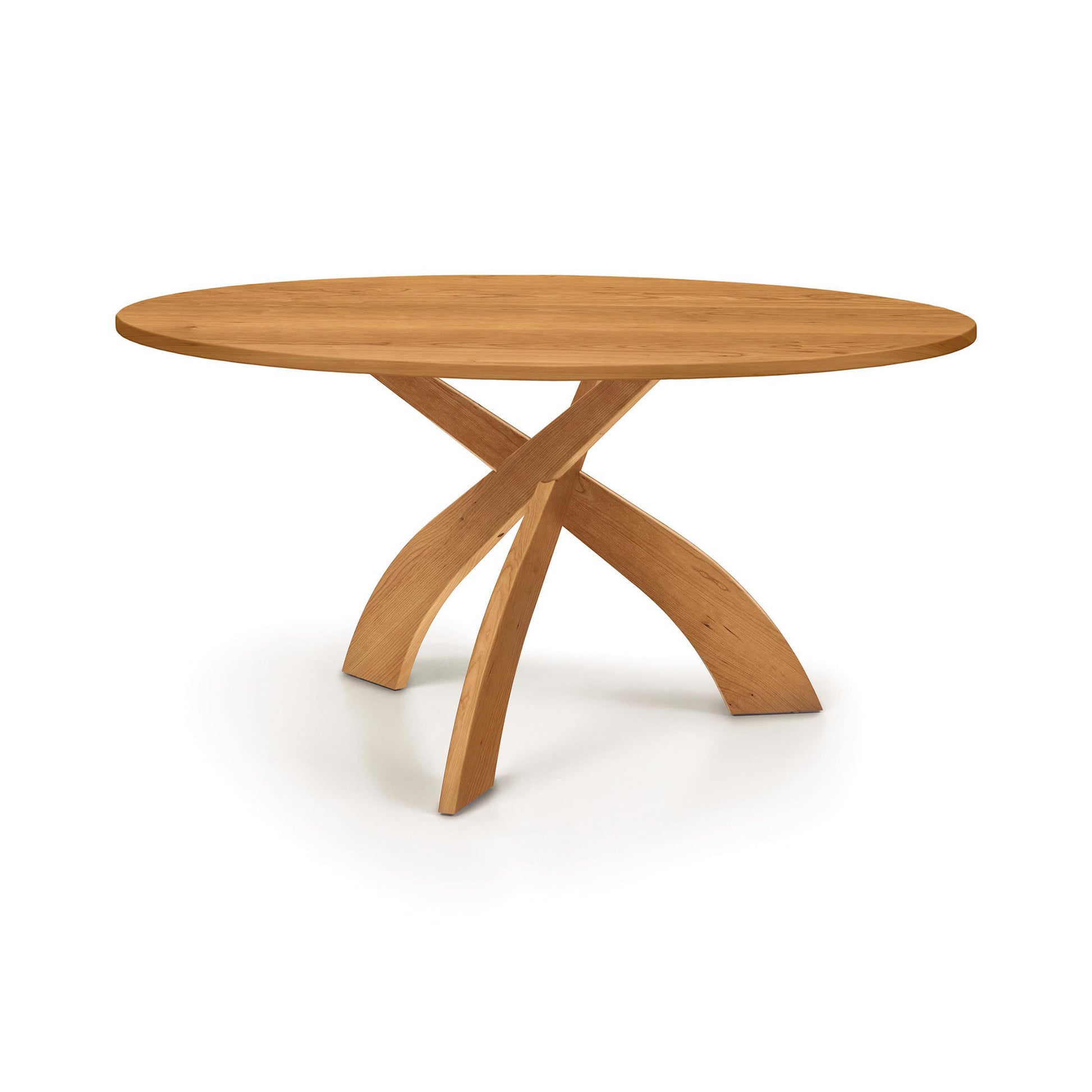 Entwine Round Solid Top Table by Copeland Furniture with cherry wood top and three curved intersecting legs, crafted in Vermont, American made.