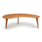 Sustainable Copeland Furniture Essentials Kidney Shaped Coffee Table with Wood Legs on a white background.