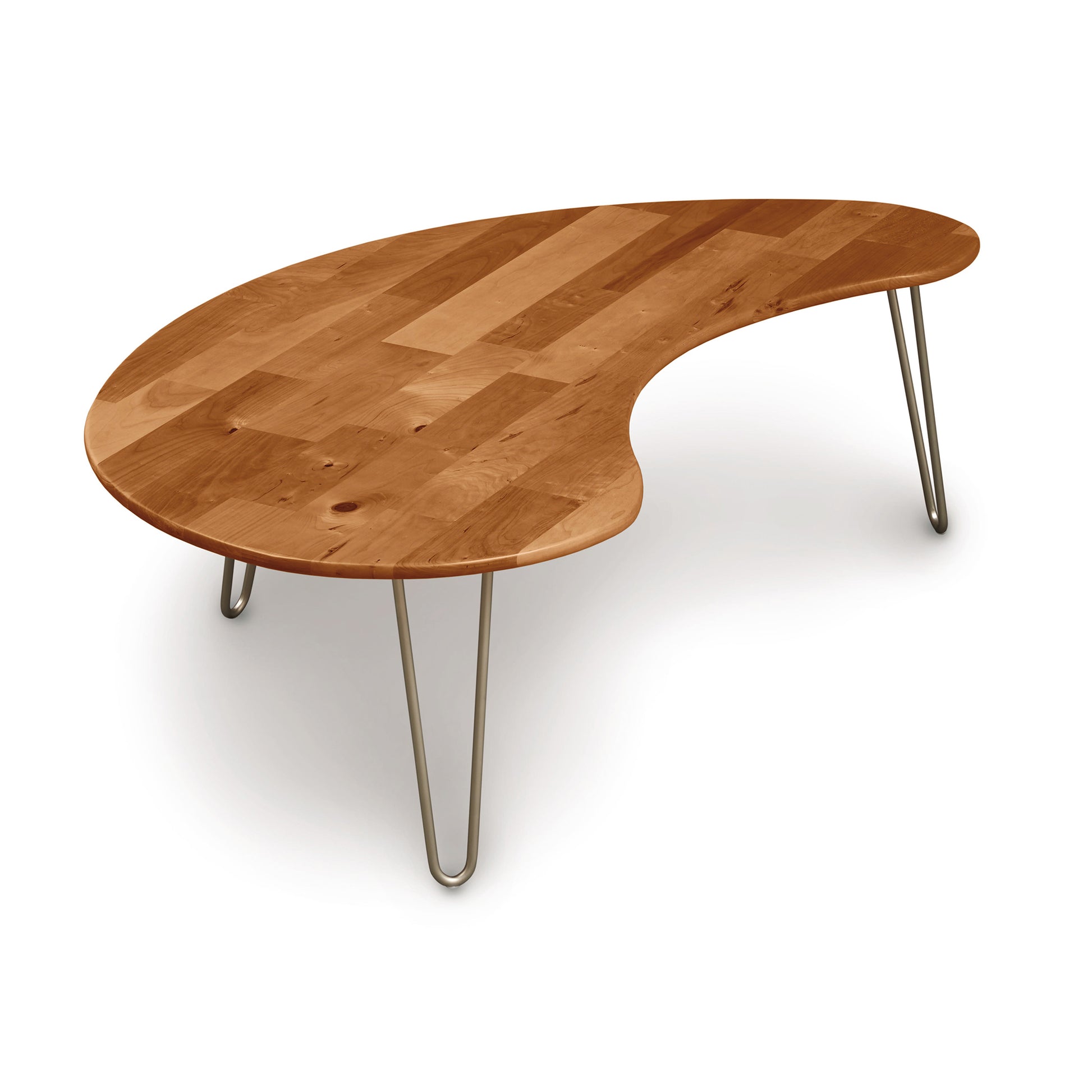 Modern Essentials Kidney Shaped Coffee Table with three metal legs, isolated on a white background by Copeland Furniture