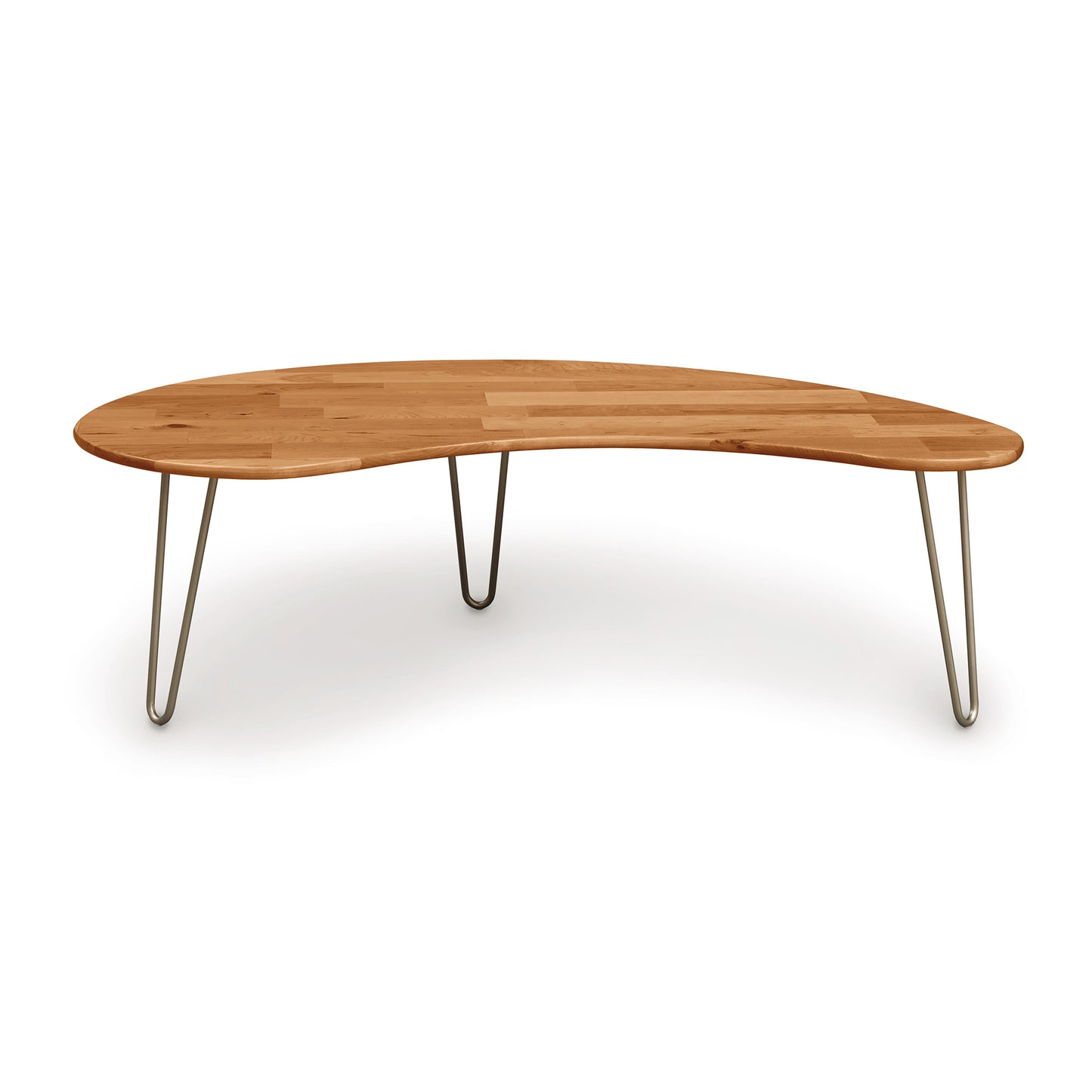 A mid-century modern wooden Essentials Kidney Shaped Coffee Table with a smooth, organic shape and four metal hairpin legs on a white background by Copeland Furniture.