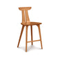 Estelle Counter Stool by Copeland Furniture showcasing a sculpted curved backrest, sturdy four-leg base, and integrated footrest in hardwood.