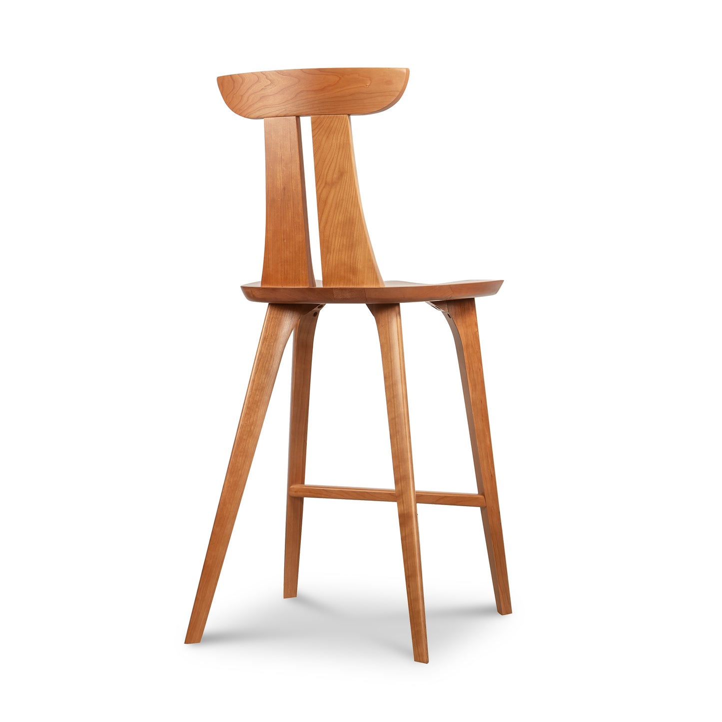 Estelle Counter Stool by Copeland Furniture showcasing mid-century modern design, curved backrest, angled legs, and footrest. American made quality.
