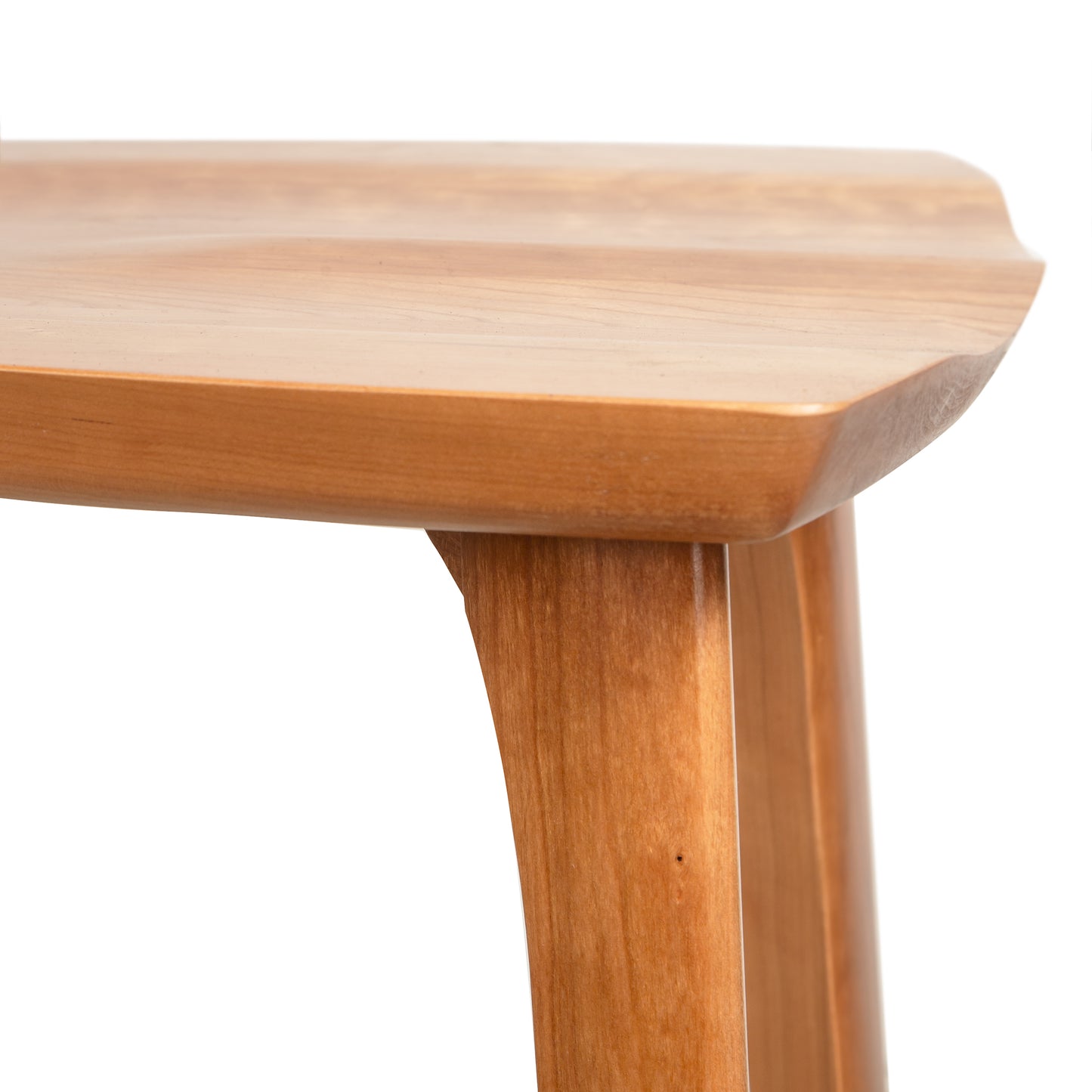 Estelle Counter Stool by Copeland Furniture featuring a smooth, rounded wooden corner and leg, highlighting its American craftsmanship.