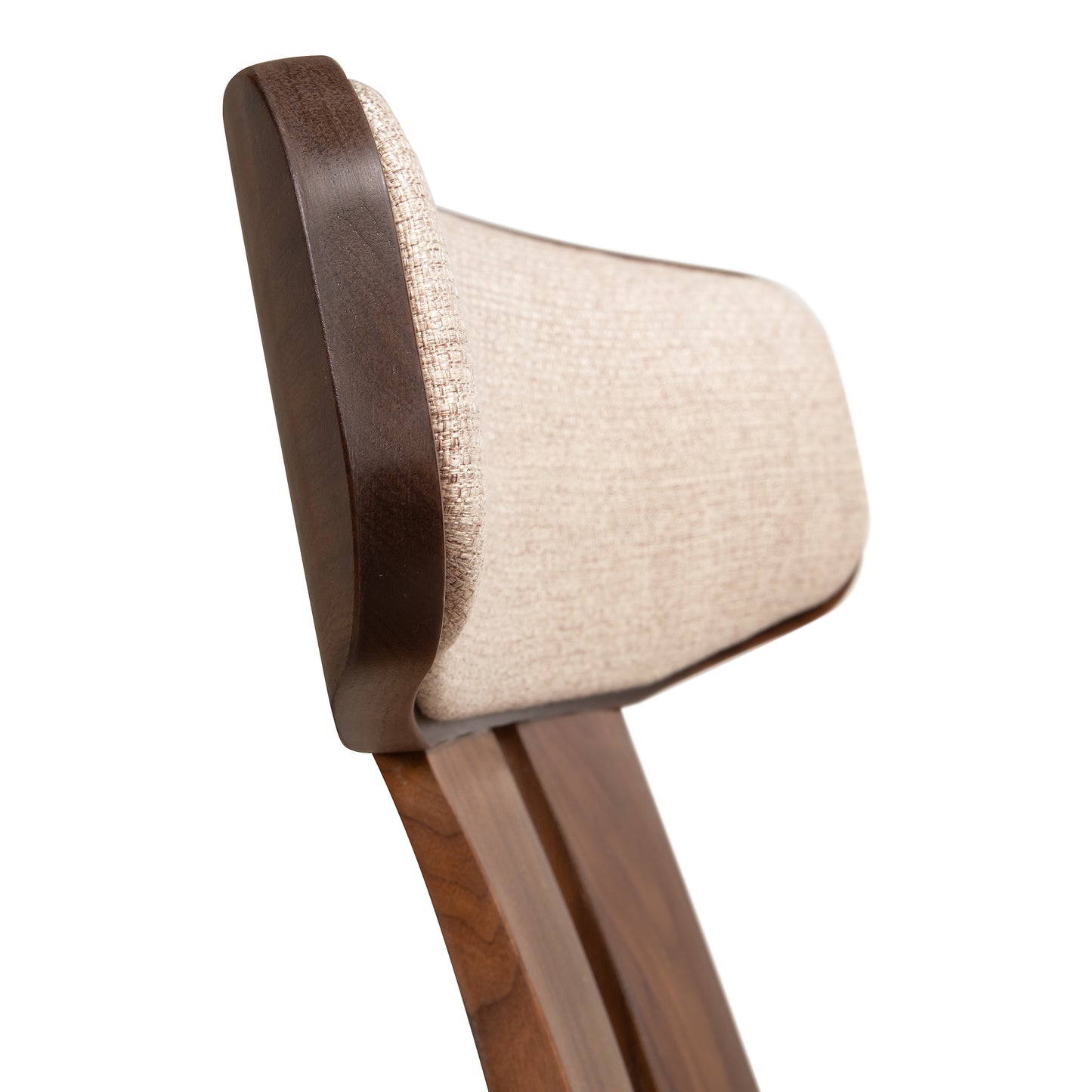 Close-up of Copeland Estelle Lounge Chair backrest, crafted in solid American hardwood with light beige upholstery.