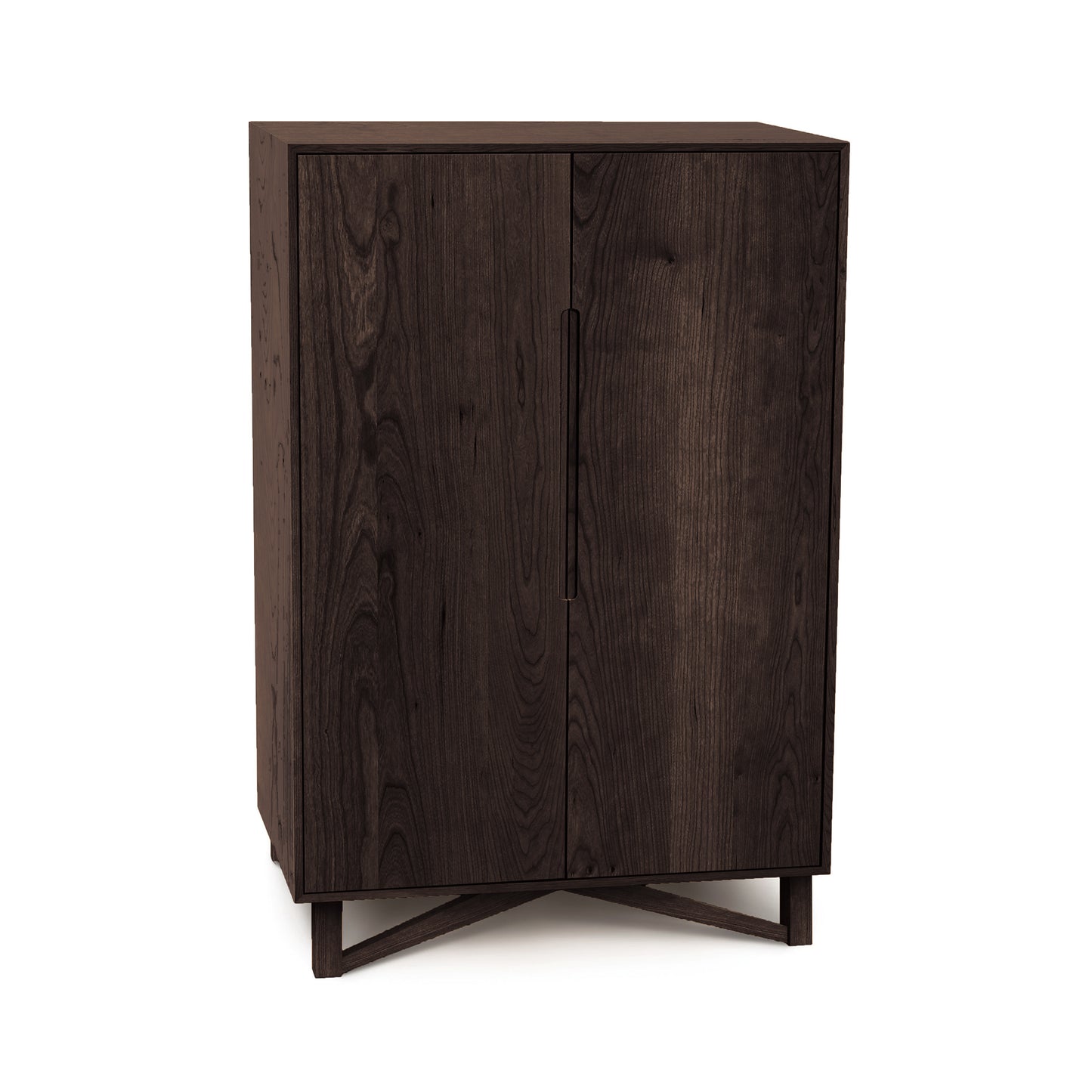 A freestanding dark wooden Copeland Furniture Exeter Bar Cabinet, featuring mid-century modern design with two doors, positioned against a white background.