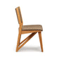 Exeter Chair by Copeland Furniture featuring modern angular legs and a beige upholstered seat, highlighting its contemporary design.