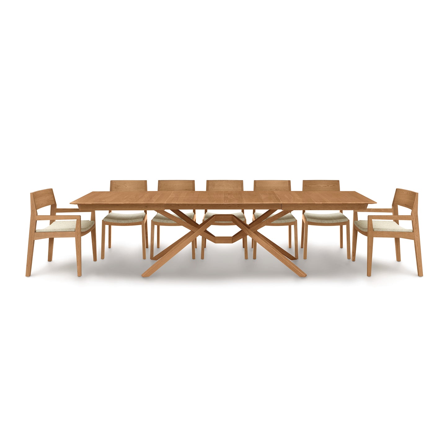 Copeland Furniture Exeter Extension Dining Table in solid North American hardwood featuring a unique cross-legged base, seating for eight.