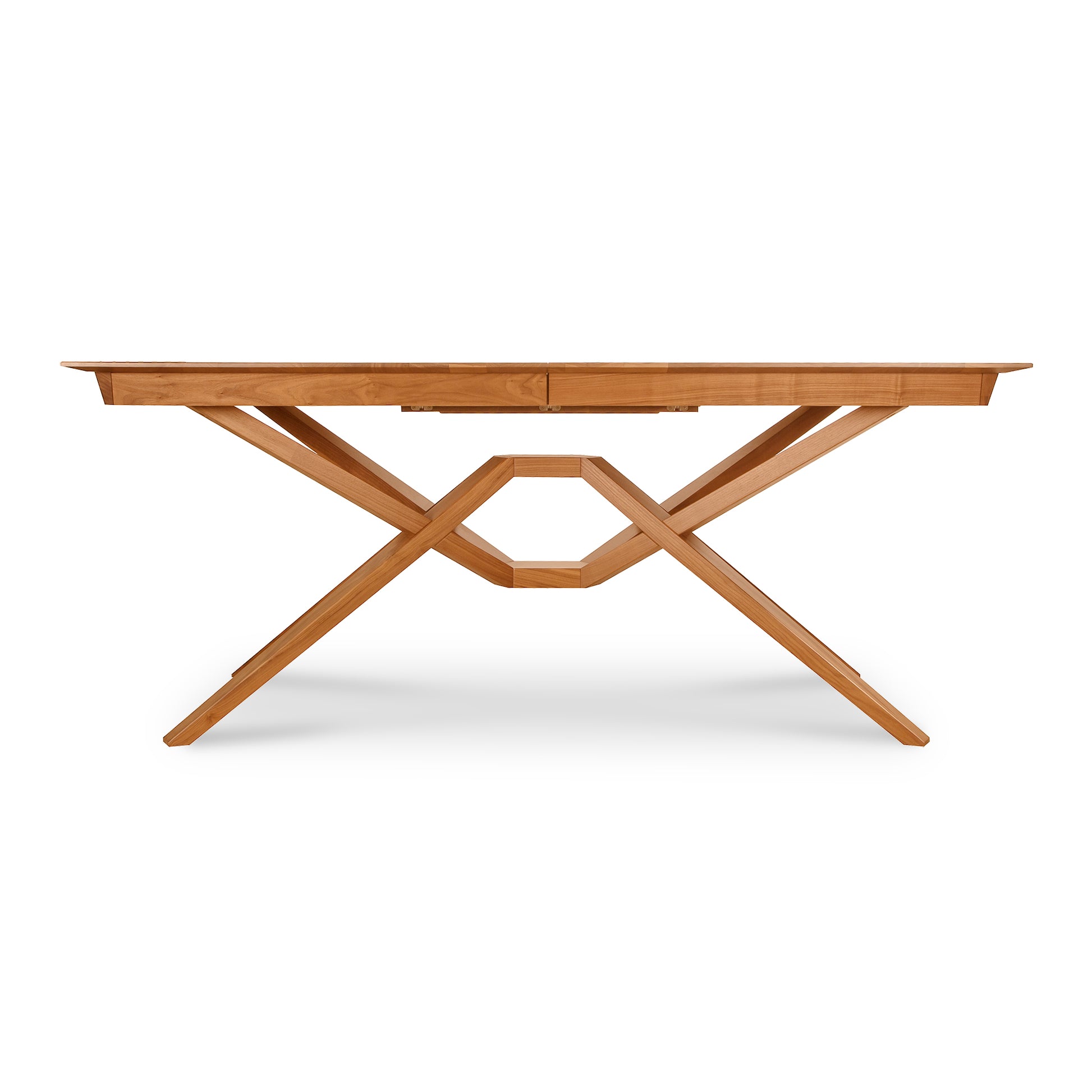 Exeter Extension Dining Table by Copeland Furniture, crafted from North American hardwood with unique intersecting legs and a geometric design.