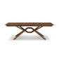 Exeter Extension Dining Table by Copeland Furniture: Elegant wooden table featuring a rectangular top and striking geometric X-shaped legs, crafted from North American hardwood.