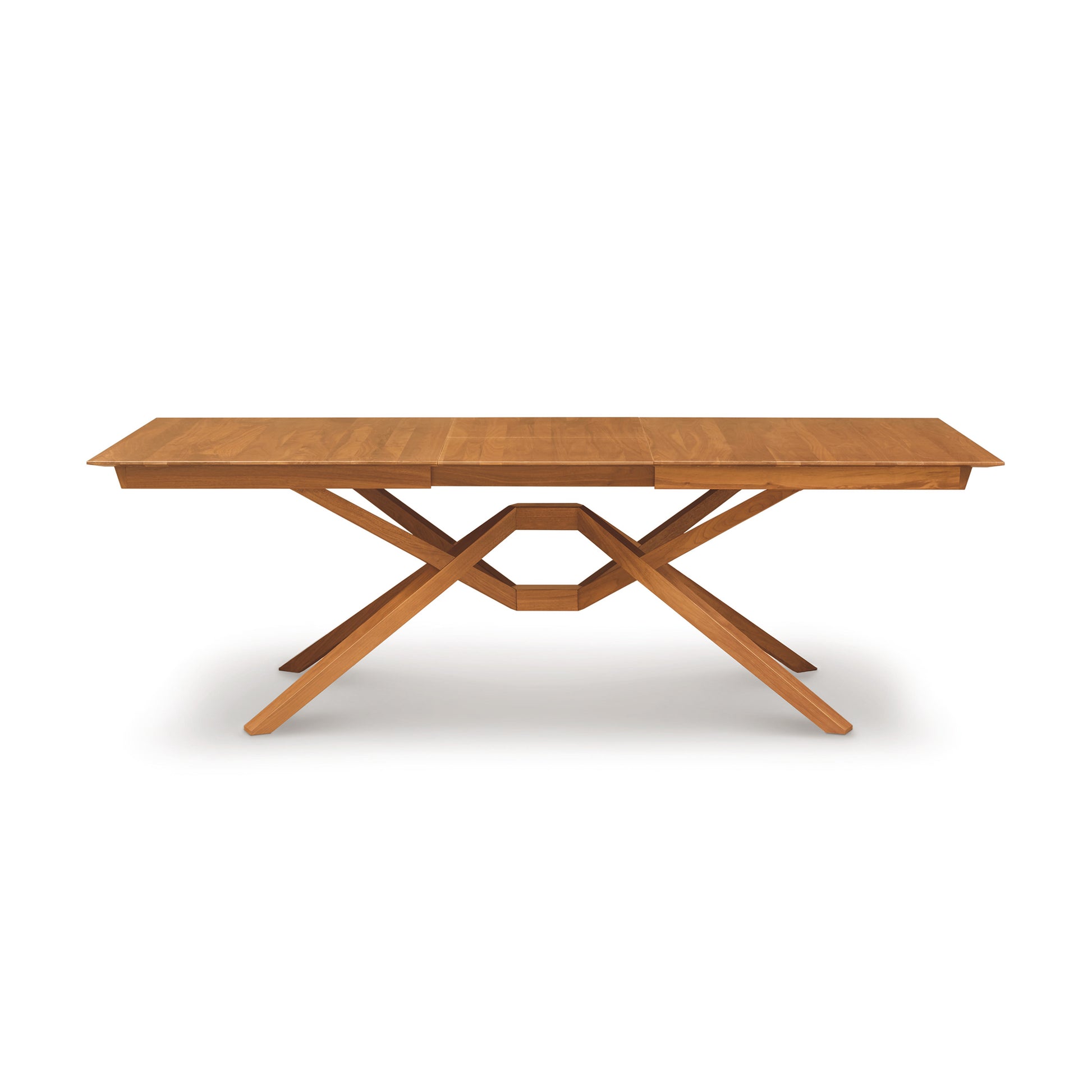 Copeland Furniture Exeter Extension Dining Table featuring a crisscross base and butterfly leaf.