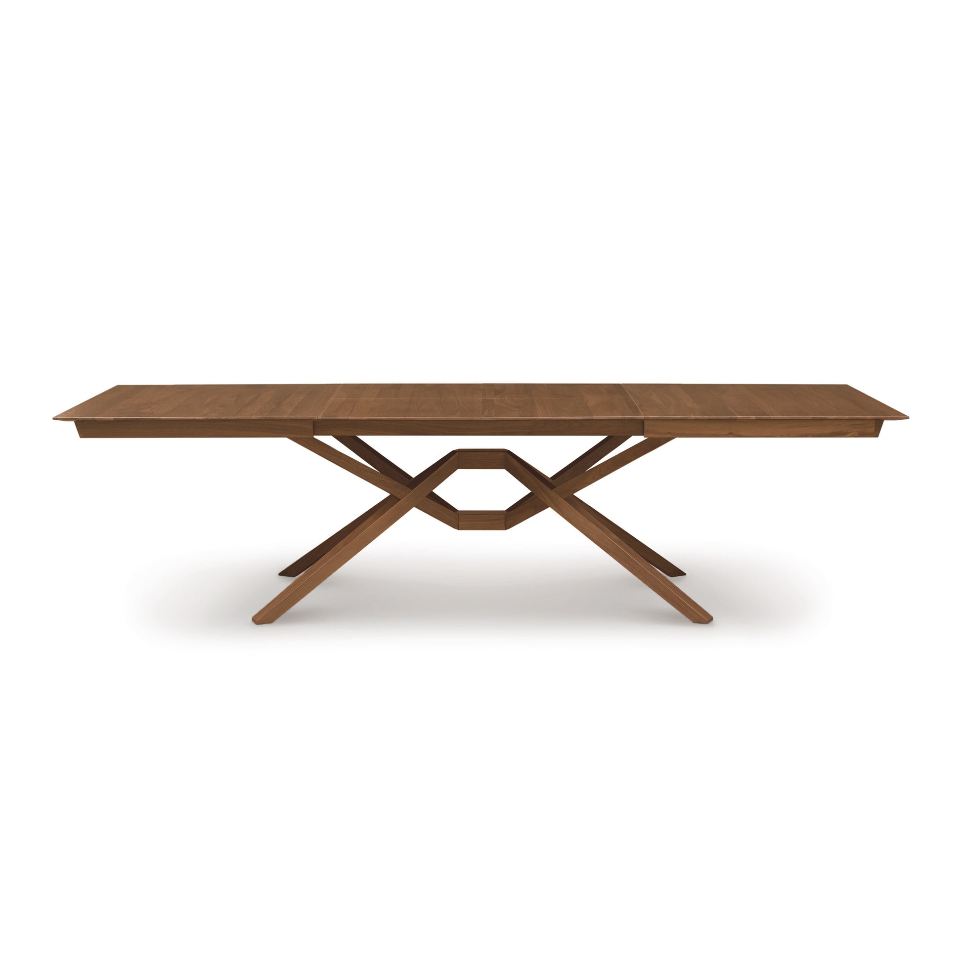 Copeland Furniture Exeter Extension Dining Table with rectangular top, distinctive crisscrossed base, and integrated butterfly leaf extension.