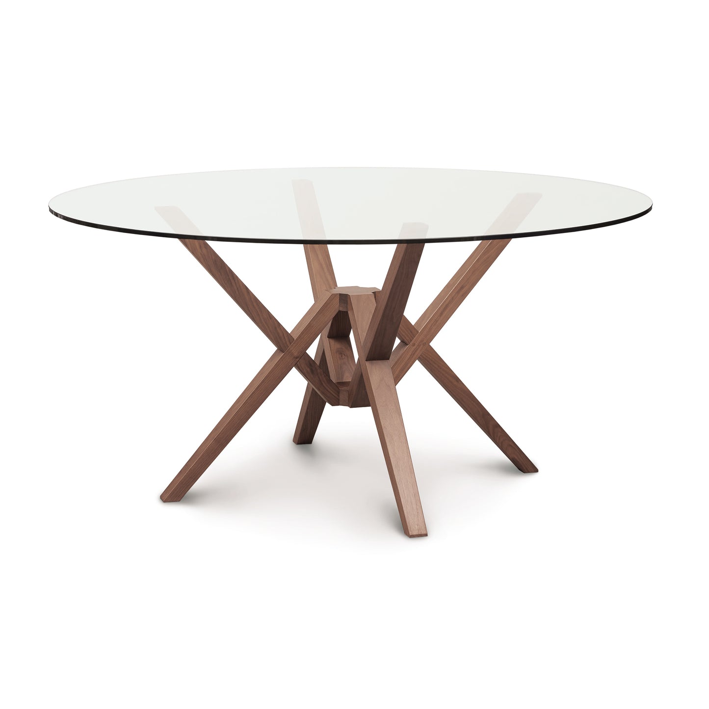The Copeland Furniture Exeter Round Glass Top Table showcases innovative engineering with its isometric design, featuring a sleek glass top and stylish wooden legs.
