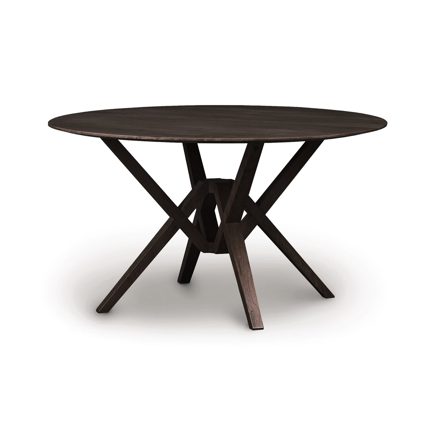 A round, dark wooden Copeland Furniture Exeter Round Solid Top Dining Table with a cross-brace base, crafted from sustainably harvested hardwoods, isolated on a white background.