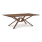 A Exeter Solid Top Dining Table from Copeland Furniture with a modern design and wooden base.