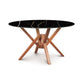 Exeter Round Table with glossy black marble-top and geometric hardwood base by Copeland Furniture.