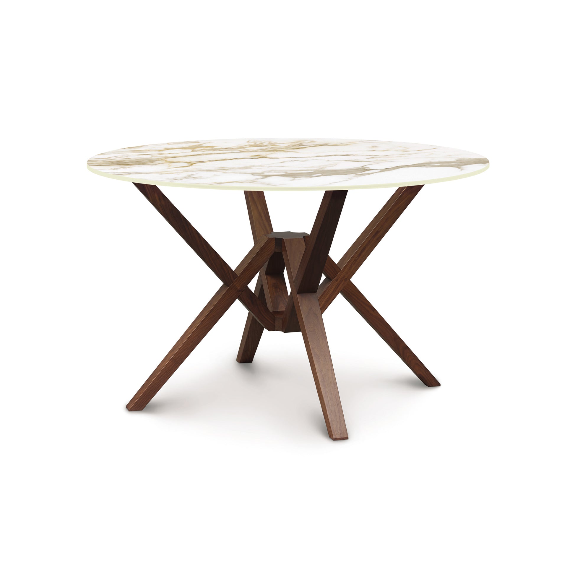 Exeter Round Table by Copeland Furniture with white marble-like sintered stone top and striking geometric hardwood legs.