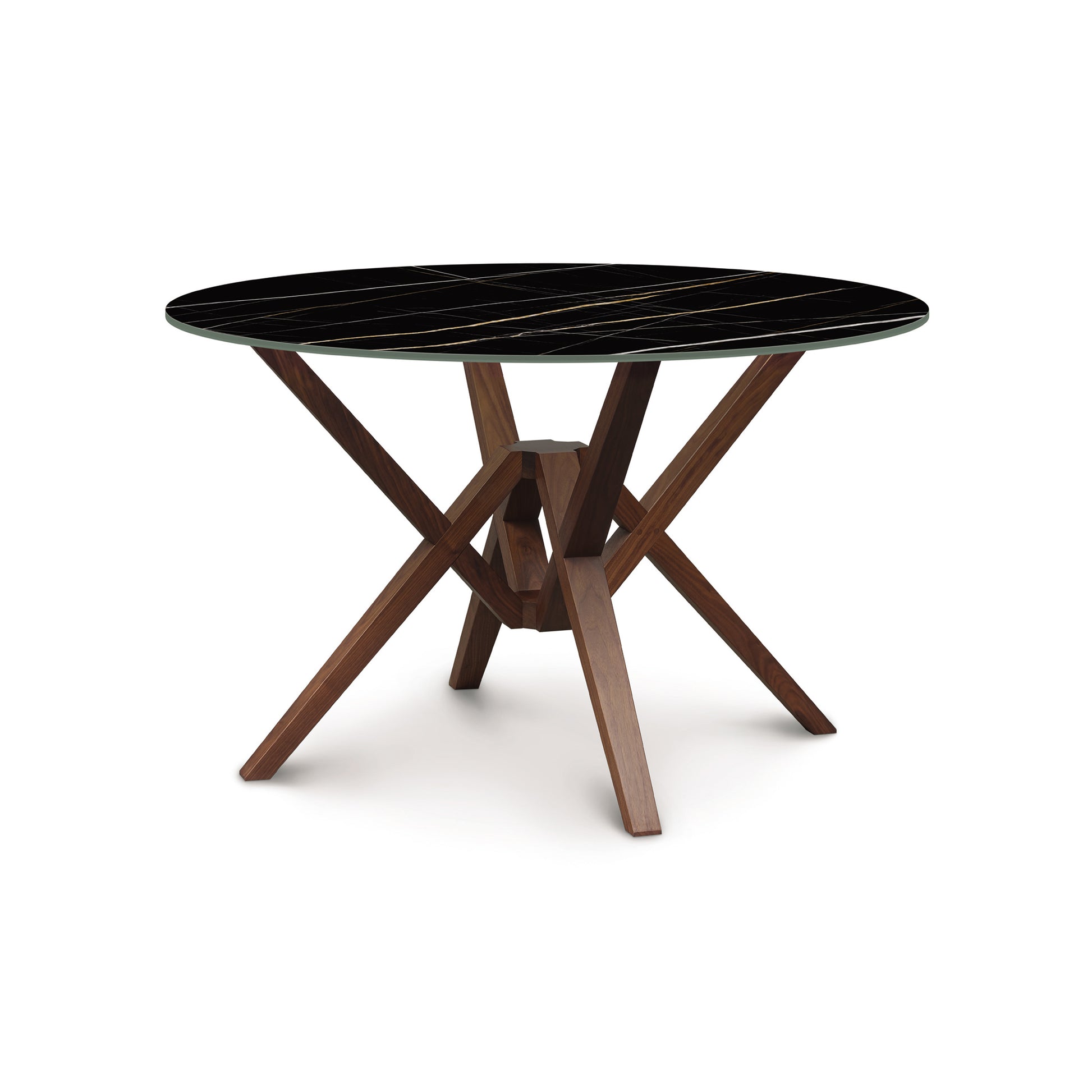 Exeter Round Table by Copeland Furniture with glossy black sintered stone top and angular wooden legs.