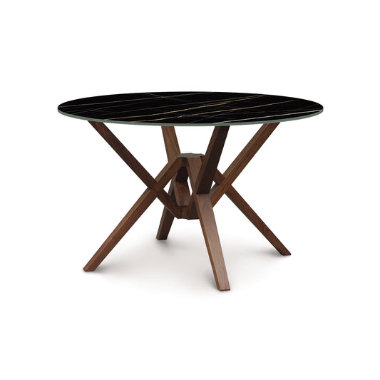 files/Exeter-Round-Sintered-Stone-Top-Table_48_Inch_Natural_Walnut_Sahara_Noir.jpg