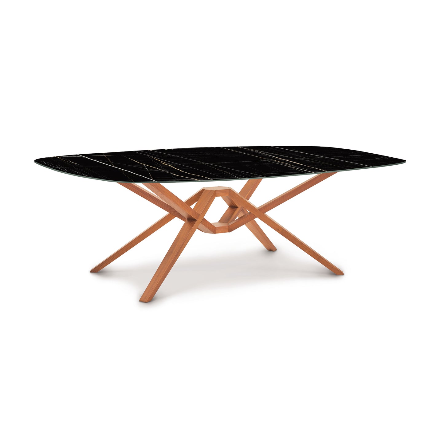 Exeter Table by Copeland Furniture with black elliptical stone top and wooden geometric base.