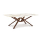 Exeter Sintered Stone Top Table by Copeland Furniture featuring a striking geometric crisscross base, highlighting American-made craftsmanship.