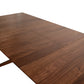 Exeter Extension Dining Table by Copeland Furniture, mid-century modern design with smooth brown wooden surface and prominent grain.