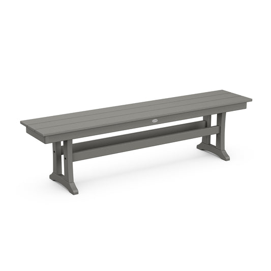 3d rendering of a modern, long POLYWOOD Farmhouse Trestle 65" Bench made from POLYWOOD lumber, with a flat gray surface and angled metal legs, isolated on a white background with slight shadowing below.