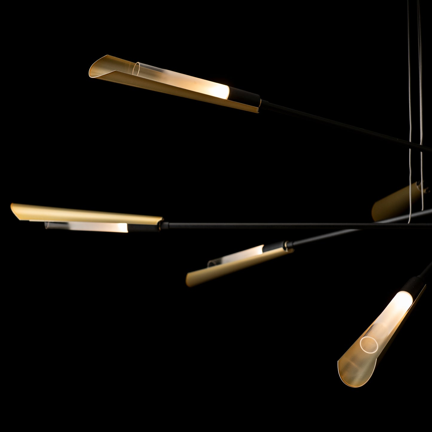 Hubbardton Forge Flight 10-Light Pendant featuring elegant horizontal tubular fixtures, highlighting handcrafted American design.