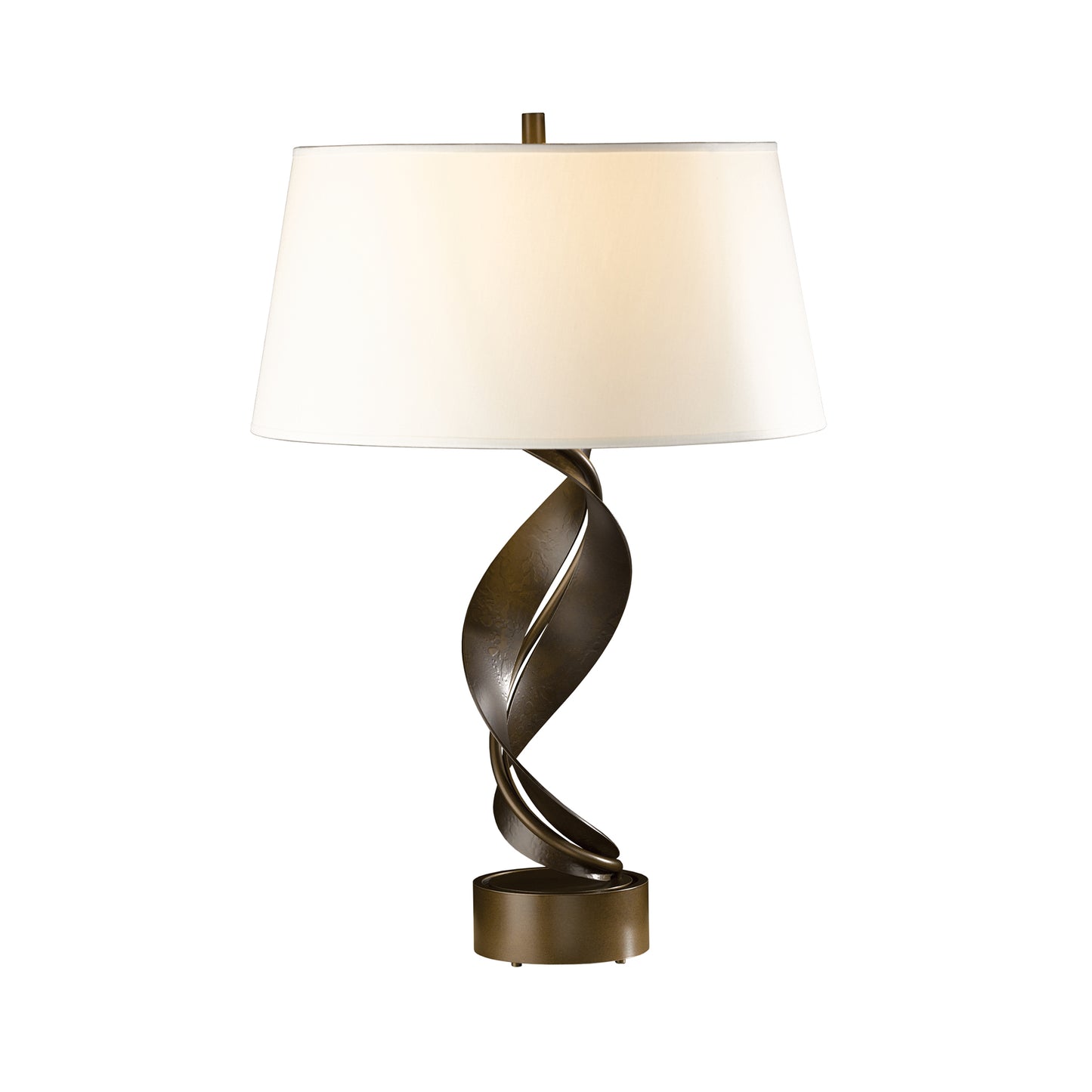 A hand-forged wrought iron Folio table lamp with a metal base and a white shade, made in Vermont by Hubbardton Forge.