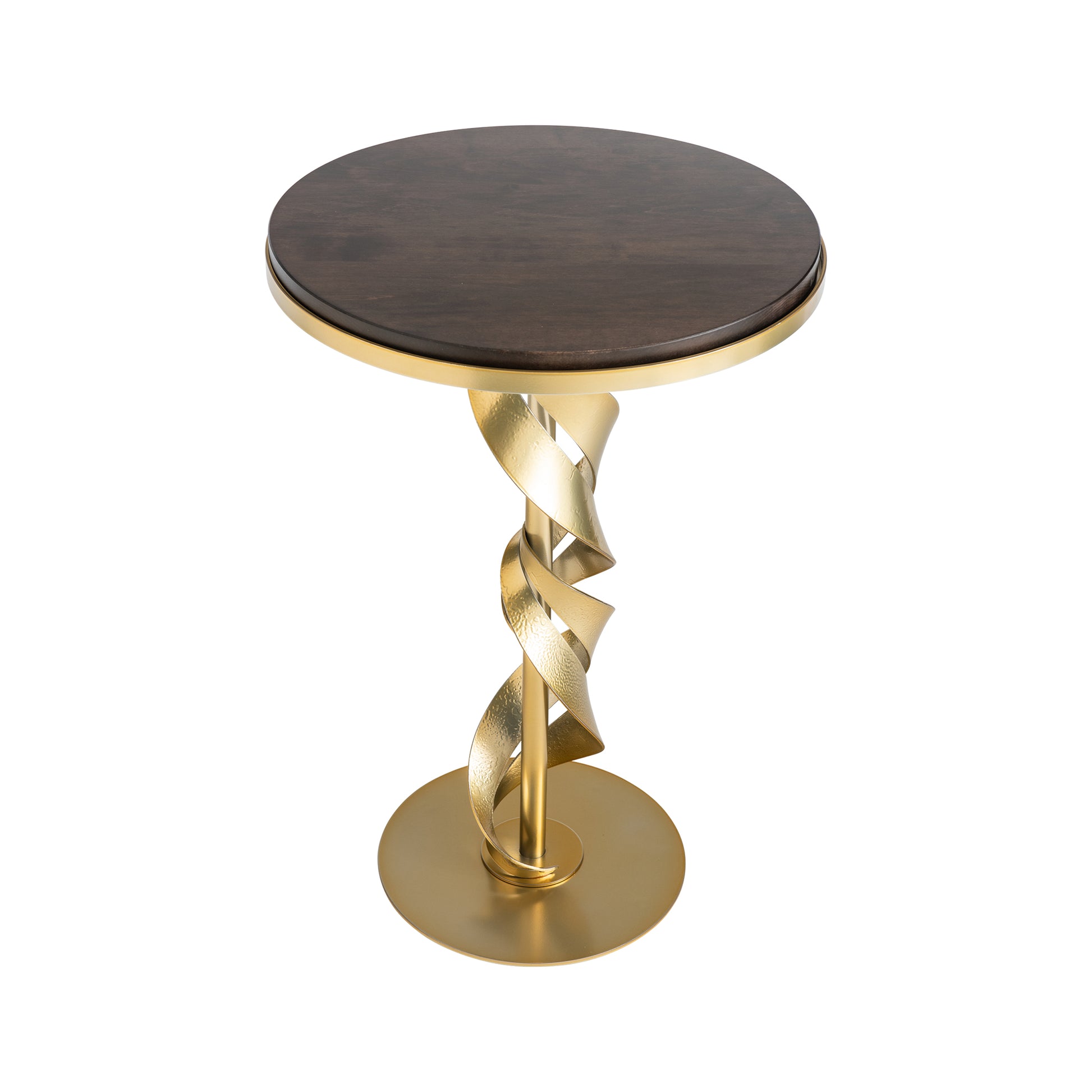 Introducing the Hubbardton Forge Folio Wood Top Accent Table, featuring a Vermont Maple Wood top with a modern brass finish. Its base showcases an elegant twisted ribbon-like design, culminating in a circular gold bottom plate.