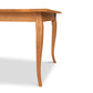 A French Country Extension Dining Table by Lyndon Furniture with a durable wooden top and legs.