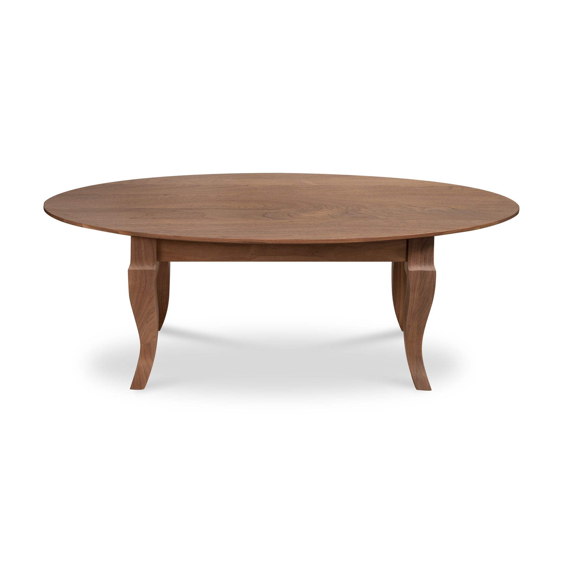 Lyndon Furniture French Country Oval Coffee Table with four curved legs and rich walnut finish, showcasing its elegant American craftsmanship.