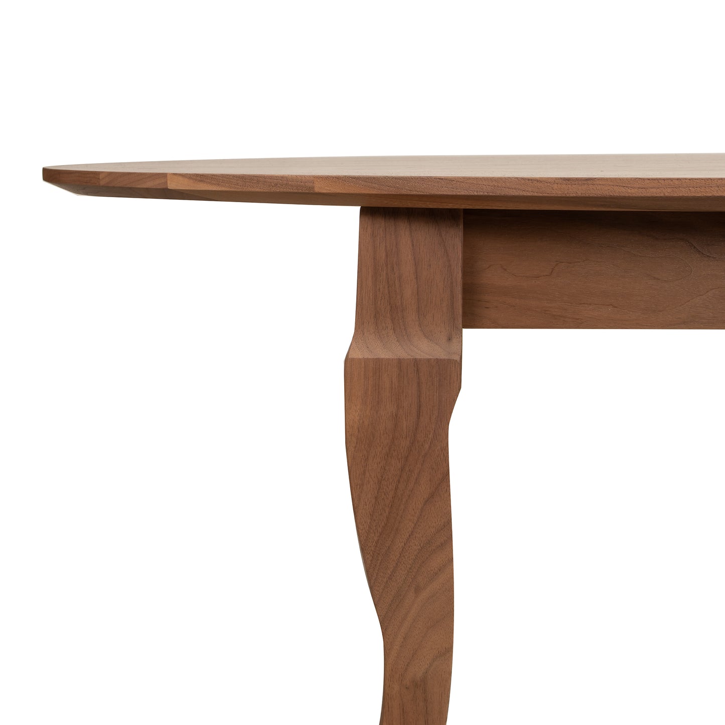 Lyndon Furniture French Country Oval Coffee Table with walnut-finished solid wood top and curved leg, highlighting craftsmanship and details.