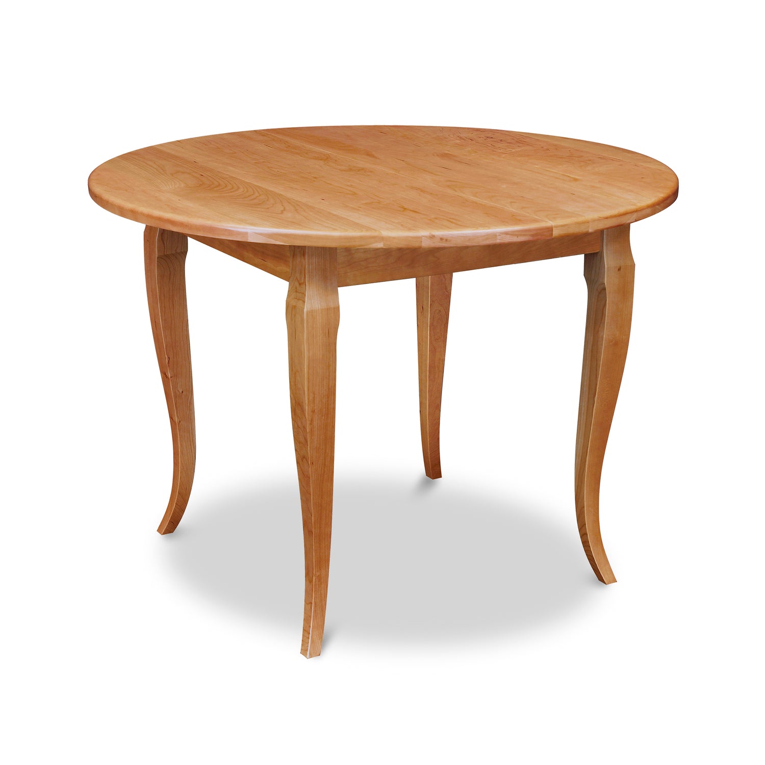 The Lyndon Furniture French Country Round Solid Top Table showcases a smooth, polished solid wood surface with four elegantly curved legs. Part of our high-quality American made French Country Furniture Collection, this light brown solid wood table is perfect for any dining room or kitchen.