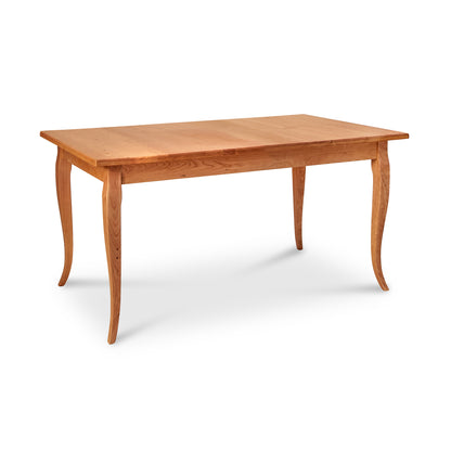 Lyndon Furniture French Country Solid Top Dining Table with curved legs and smooth hardwood surface, expertly handcrafted in Vermont.